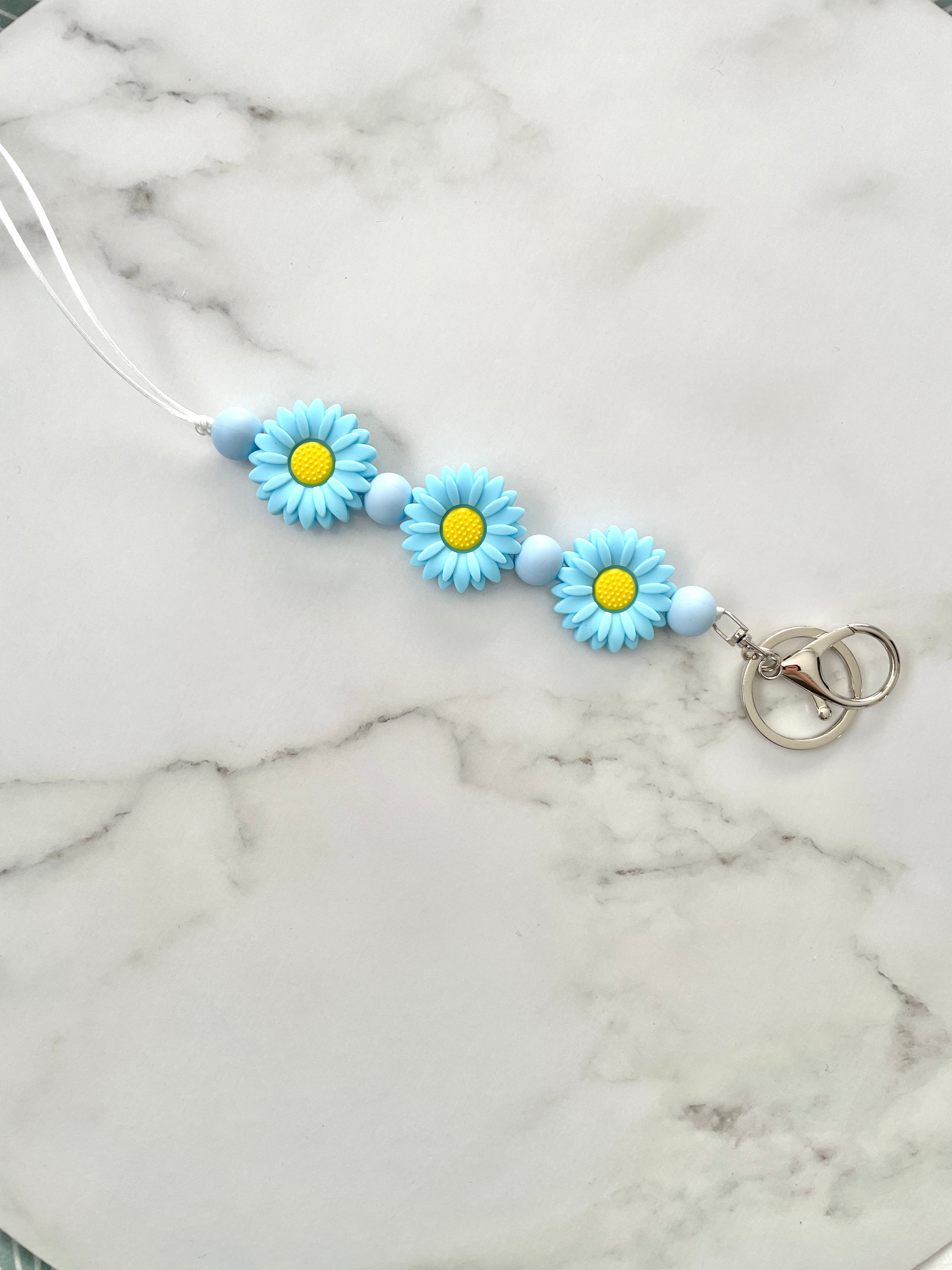 flower trio lanyard blue